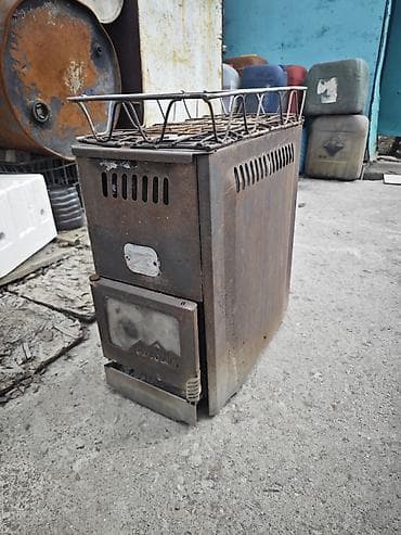 Металлическая печь-буржуйка компактного формата. Характеристики и at lalafo.kg Металлическая печь-буржуйка компактного формата. Характеристики и