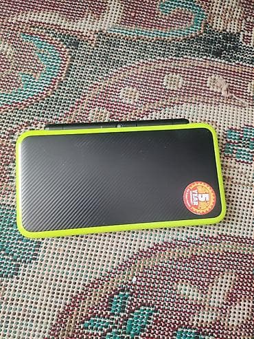 Срочно продаю Портативная игровая консоль Nintendo 2DS XL (New