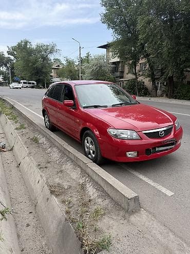 Mazda 323: 2002 г., 1.6 л, Механика, Бензин, Хэтчбэк