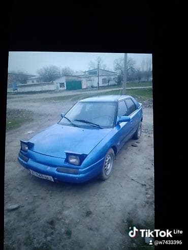 mazda 121: Mazda 323: 1992 г., 1.6 л, Ручные, Бензин, Лифтбек — 6