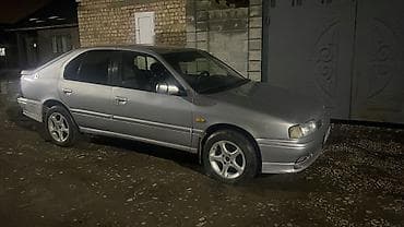 передний сиденья: Nissan Primera: 1995 г., 1.6 л, Ручные, Бензин, Седан — 6