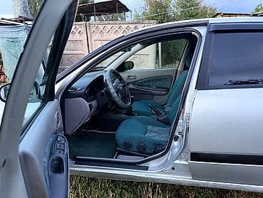 wuling mini ev: Nissan Almera: 2002 г., 1.8 л, Механика, Бензин, Хэтчбэк — 5