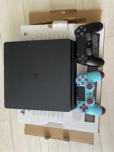 Игровая приставка PlayStation 4 Slim (черная) 1тб В комплекте: - — 2