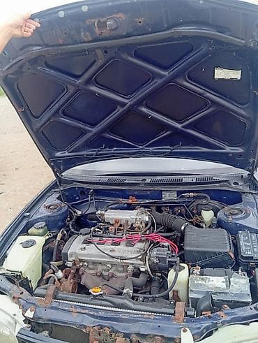 машиа: Toyota Corolla: 1995 г., Механика, Бензин, Универсал — 4