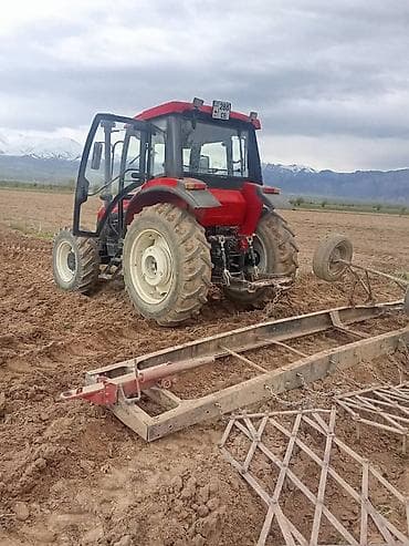 Фронтальные КУНы: Трактор колесный, кабина с остеклением по периметру и рабочей — 5