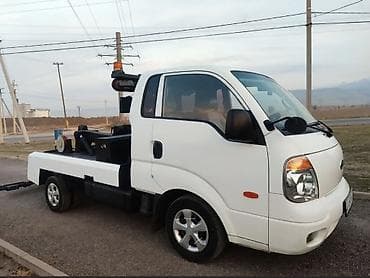 kia c5: Эвакуатор, Kia, 2011 г., Сдвижная — 1