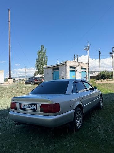 Audi A6: 1994 г., 2.6 л, Механика, Газ, Седан — 7