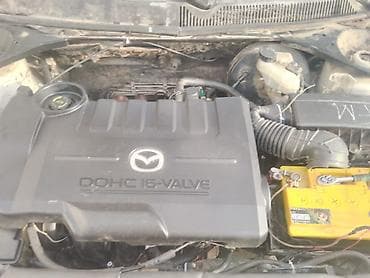 кулиса спейс стар: Mazda/Ford бензиновый двигатель DOHC 16-valve с навесным - Тип — 2