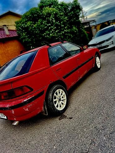 chery arizo: Mazda 323: 1990 г., 1.6 л, Механика, Бензин, Лифтбек — 5