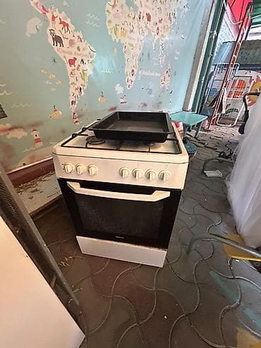 Газовая плита с духовкой, напольная, стандартной ширины 50–60 см at lalafo.kg Газовая плита с духовкой, напольная, стандартной ширины 50–60 см