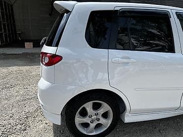 Mazda Demio: 2003 г., 1.5 л, Типтроник, Бензин, Хетчбек — 6