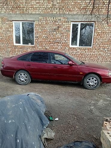 арзан машина мазда: Mazda Cronos: 1993 г., 2 л, Механика, Седан — 4