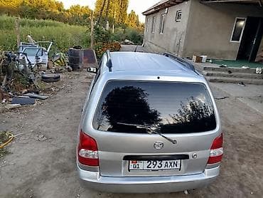 byd e2 2022: Mazda Demio: 2002 г., Механика, Бензин, Универсал — 5