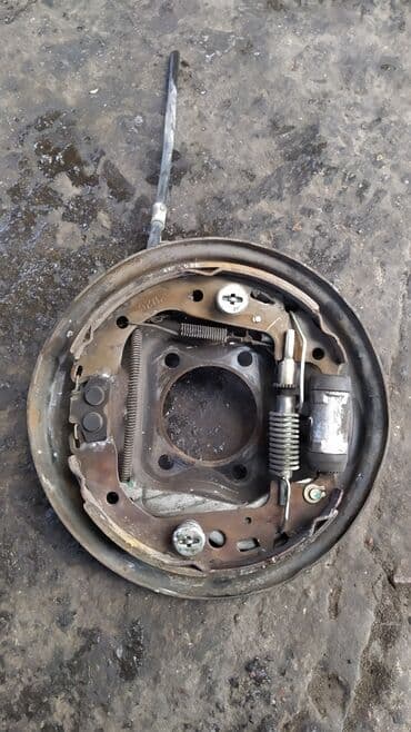 система форсунок: Toyota Funcargo колодки ручника, Тойота Фанкарго механизм заднего — 2