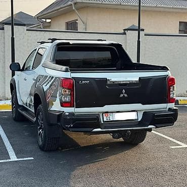 Mitsubishi L200: 2023 г., 2.4 л, Механика, Газ, Пикап — 1