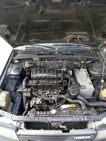 садовый измелчитель: Mazda 323: 1987 г., 1.7 л, Механика, Дизель — 7