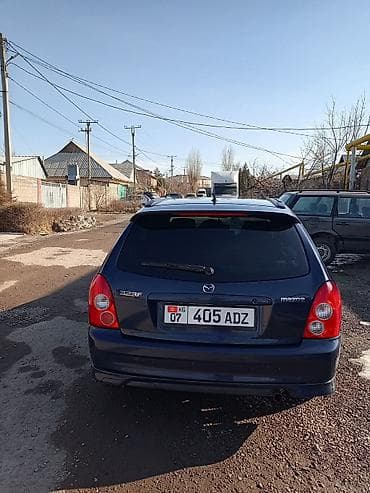 mazda 323 f: Mazda 323: 2002 г., 1.6 л, Ручные, Бензин, Хэтчбэк — 7