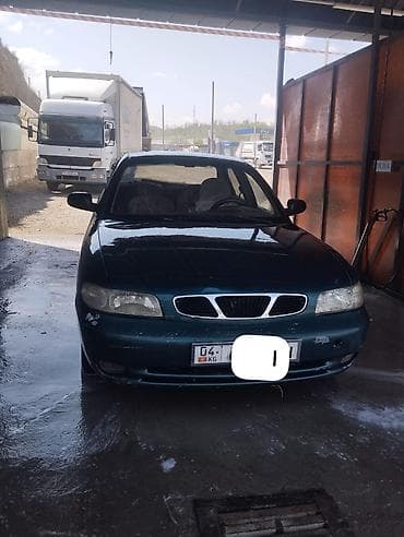 k60 pro: Daewoo Nubira: 1997 г., Ручные, Бензин, Седан — 1