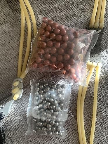 рогатка для охоты: Металическая рогатка Комплект: Сама рукоять 200шт пули из глины 100шт — 2