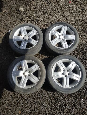 калдым ордо: Продаю диски с резинами комплект от Субару размер R17 оригинал Enkei — 1