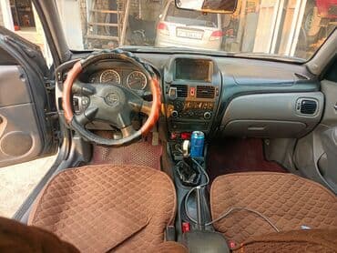 mini cooper: Nissan Almera: 2003 г., 1.5 л, Механика, Бензин, Хэтчбэк — 9