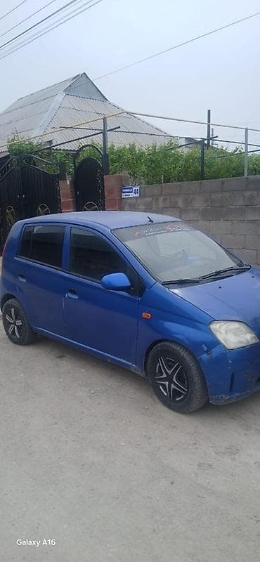 Daihatsu Cuore: 2003 г., 1 л, Механика, Бензин, Хэтчбэк