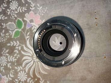 материал на чехол: Объектив Sigma 30mm f/1.4 DC DN (диаметр фильтра 52 мм) - Фокусное — 5