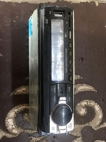 Автомобильная магнитола 1DIN с мультимедиа Основные возможности: -