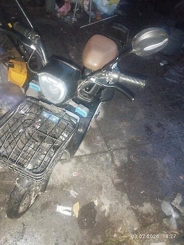 Электрический скутер городского типа - Компоновка step-through с