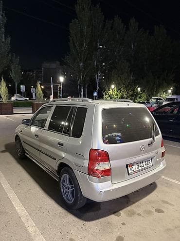 стеклоподъёмники: Mazda Demio: 2003 г., 1.3 л, Механика, Бензин, Хэтчбэк — 4
