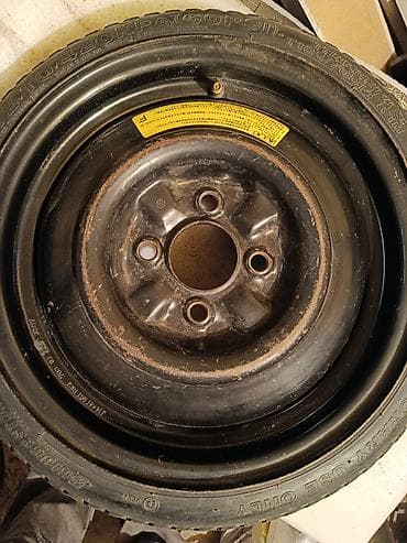 резина 14 с: Колеса в сборе 70 / R 14, Запаска, Легковые, Железные, отверстий - 4 — 1
