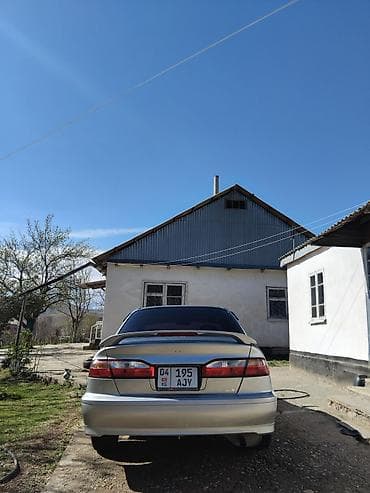 растовые куклы: Серебристый седан с аэродинамическим обвесом и спойлером на крышке — 5