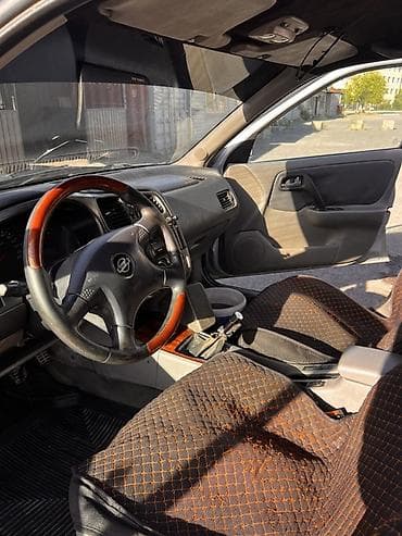 fit 3: Nissan Primera: 2001 г., 2.4 л, Механика, Бензин, Универсал — 8