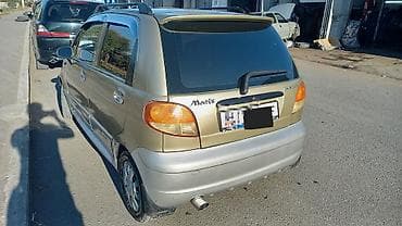 q 7: Daewoo Matiz: 2005 г., 1 л, Механика, Бензин, Хэтчбэк — 2