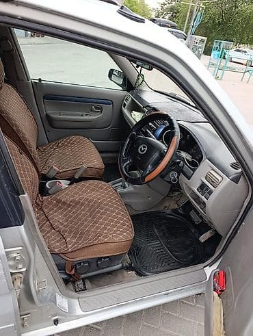 Транспорт: Mazda Demio: 2001 г., 1.3 л, Автомат, Бензин, Хэтчбэк — 9