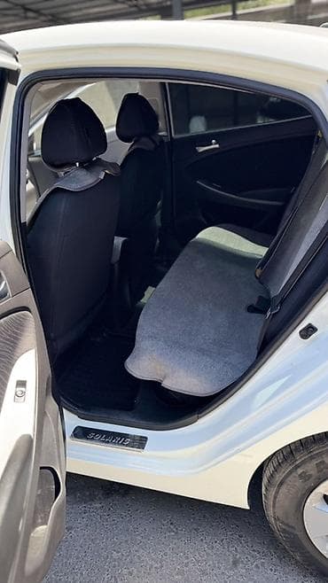 6: Hyundai Solaris: 2015 г., 1.6 л, Автомат, Бензин, Седан — 9