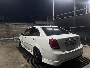 5 5 compressor: Белый седан компакт-класса. Пятидверный кузов с аэродинамическим — 8