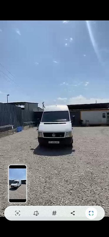 шлем с визором: Volkswagen LT длиннобазный, высокий кузов, белый фургон. Кузов: - — 1