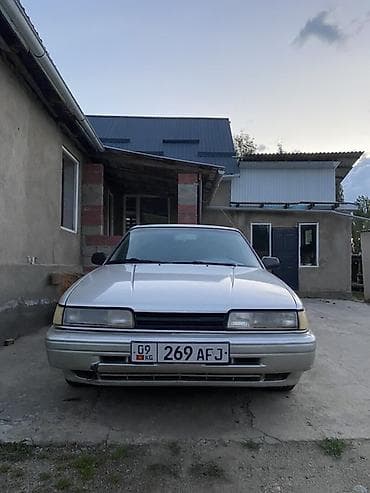 byd plus: Mazda 626: 1989 г., 2 л, Механика, Бензин, Универсал — 10