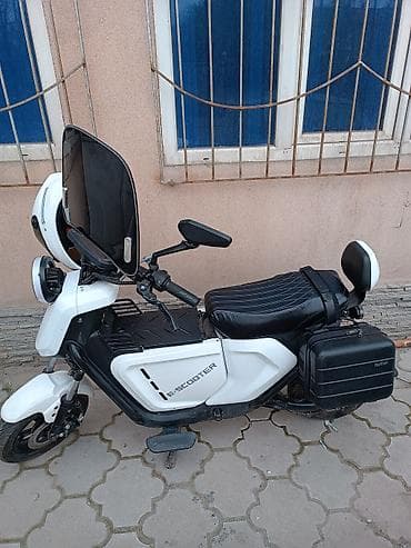 Электроскутер e-Scooter, городской формат - Компоновка step-through с