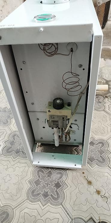 газовый кател бу: Котёл газовый напольный "Гефест", б/у с трубой в комплекте — 2