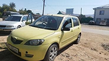 женский авто: Mazda Demio: 2004 г., 1.5 л, Автомат, Бензин, Хэтчбэк — 3