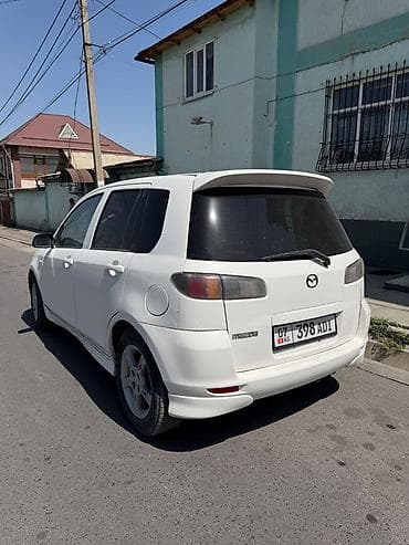 спойдер: Mazda Demio: 2002 г., 1.5 л, Автомат, Бензин, Хэтчбэк — 2