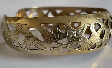 honor bend: Серебряный браслет с позолотой с ажурным орнаментом. В центре браслета — 5