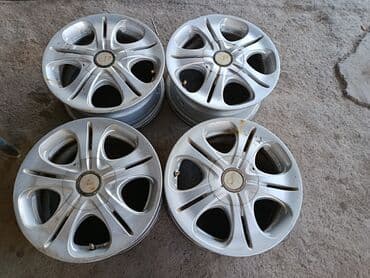 купить диски штампованные: Предлагается комплект автомобильных колёс, состоящий из шин и литых — 30