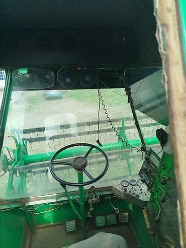 mazda kapella: Зерноуборочный комбайн (самоходный) Описание: - Классическая схема с — 3