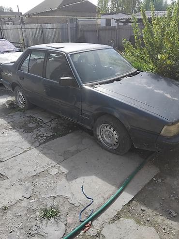 мазда 323 седан: Mazda 626: 1987 г. — 3