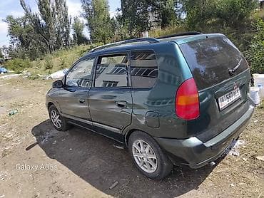 на портер кузов: Mitsubishi Space Star: 1998 г., 1.3 л, Механика, Бензин, Универсал — 10