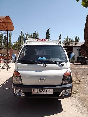 70 сом: Hyundai Porter II (бортовой малотоннажный грузовик) - Кабина — 1