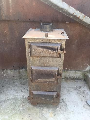 купить машину земли: Металлическая твердотопливная печь («буржуйка») вертикального типа — 1